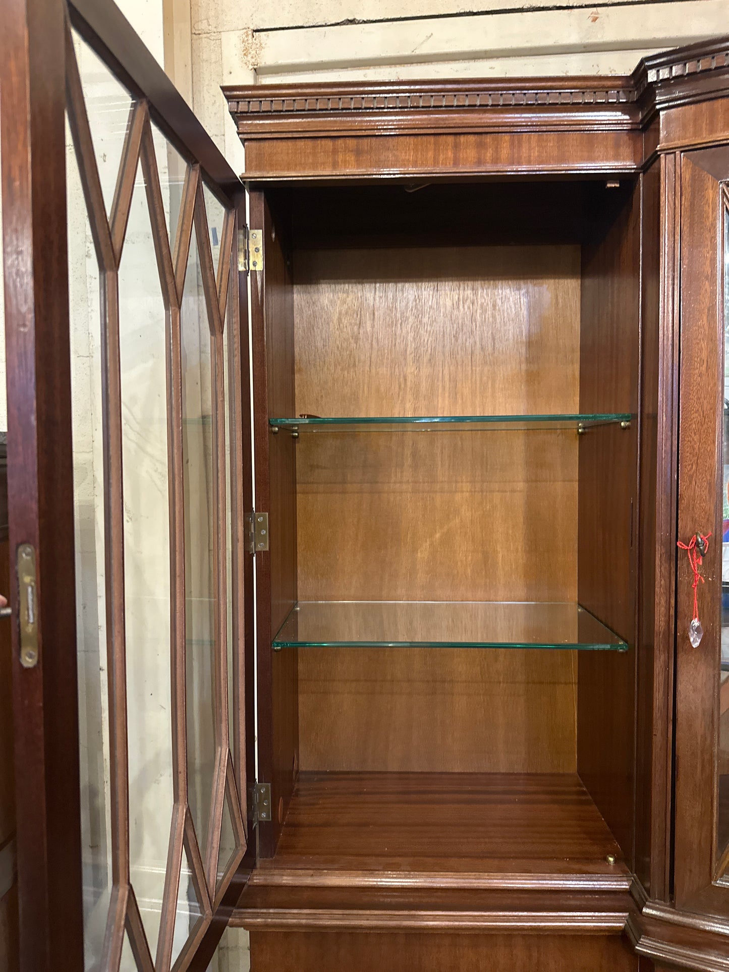 Mid 1900s Georgian mahogany breakfront China cabinet