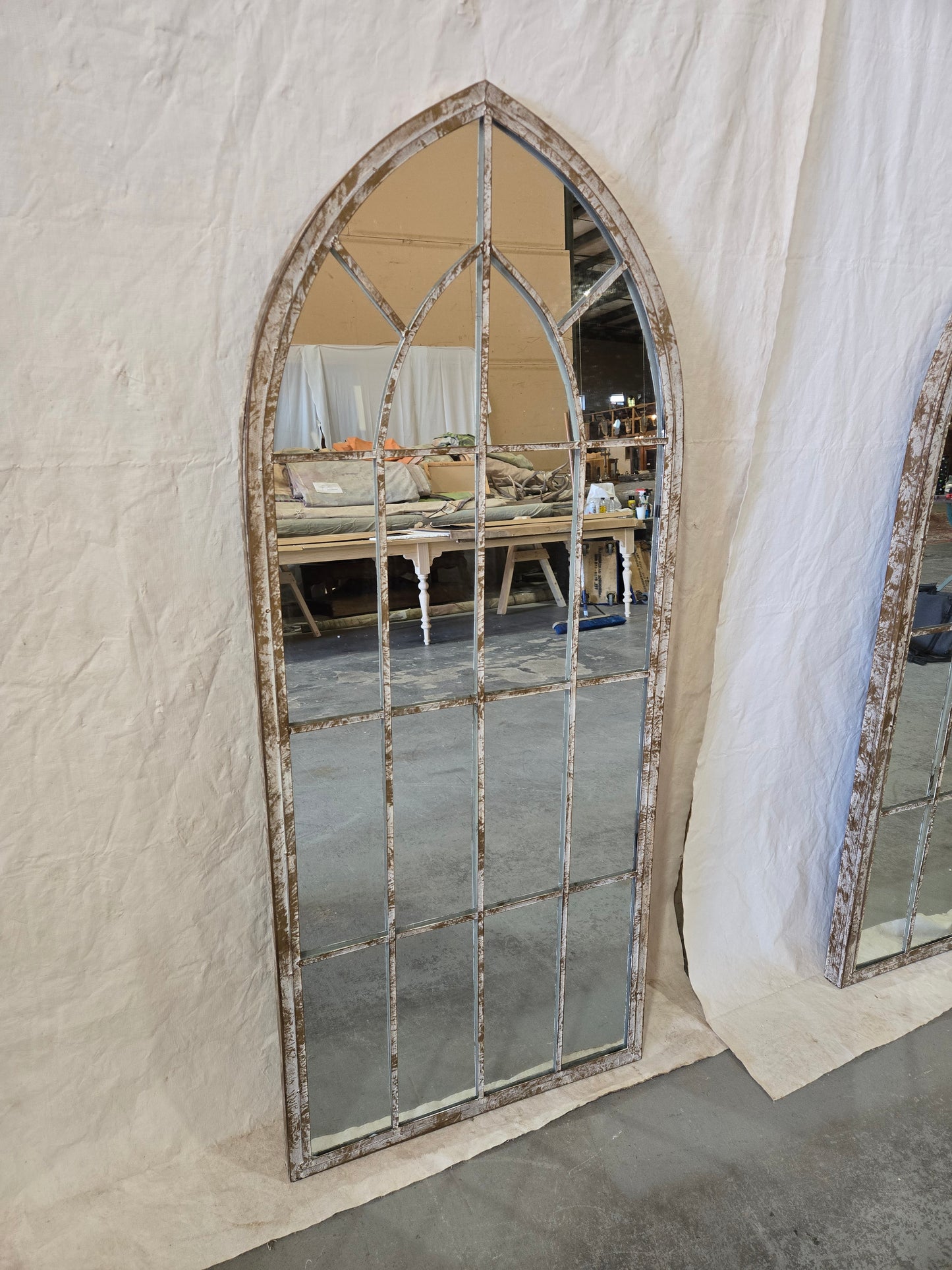 Arched mullion mirror