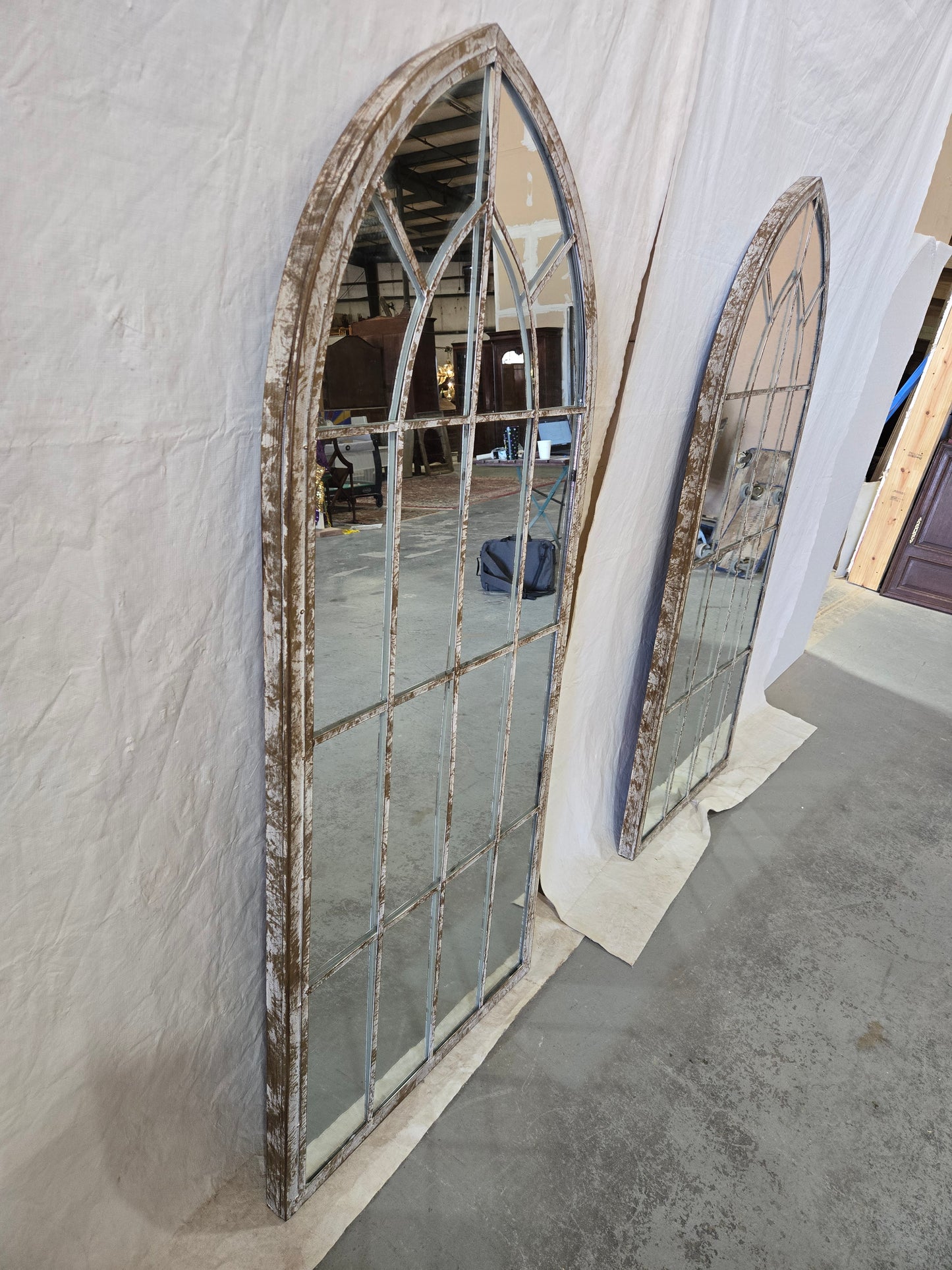 Arched mullion mirror