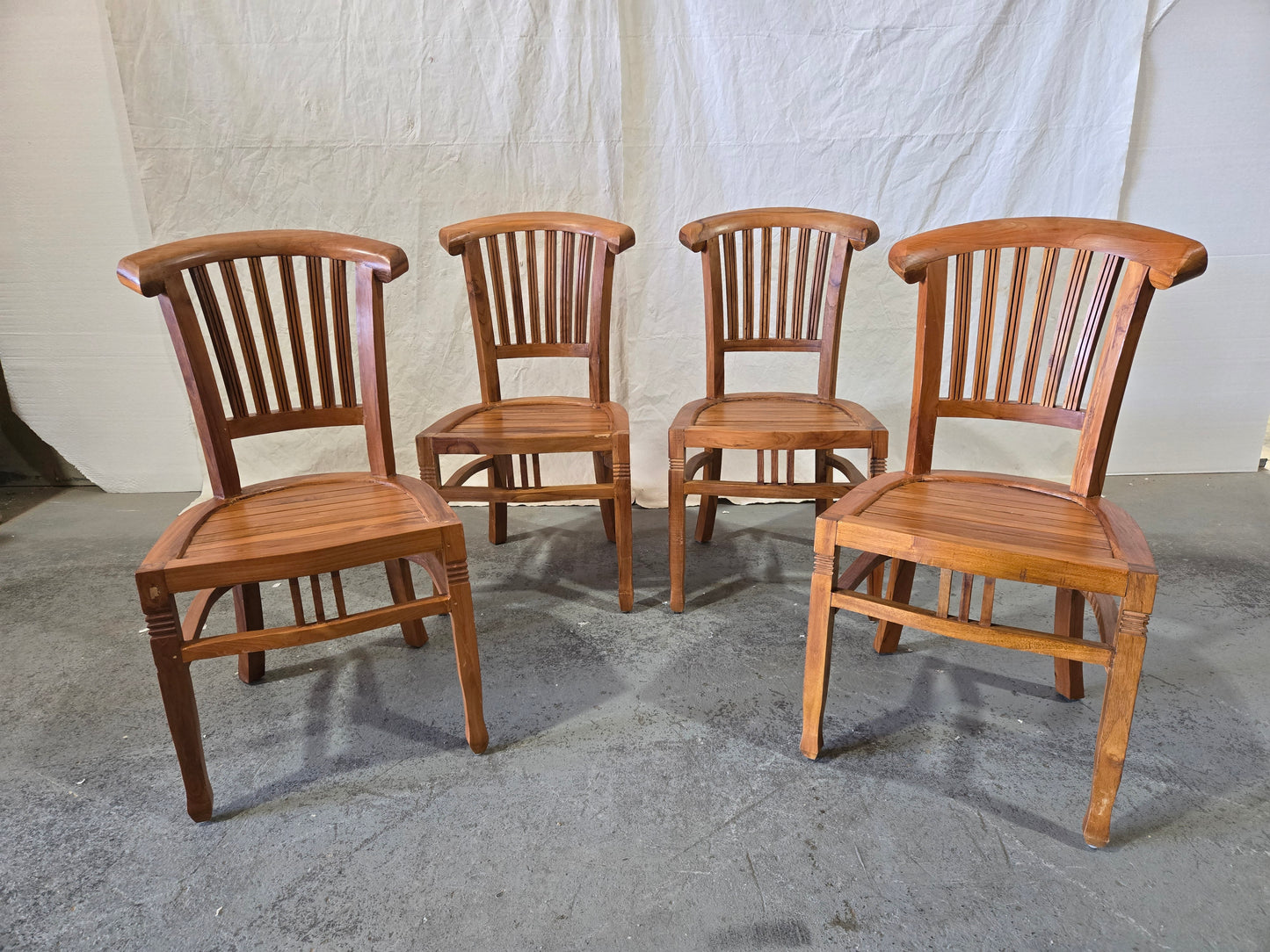 Set of 4 Early century teak chairs