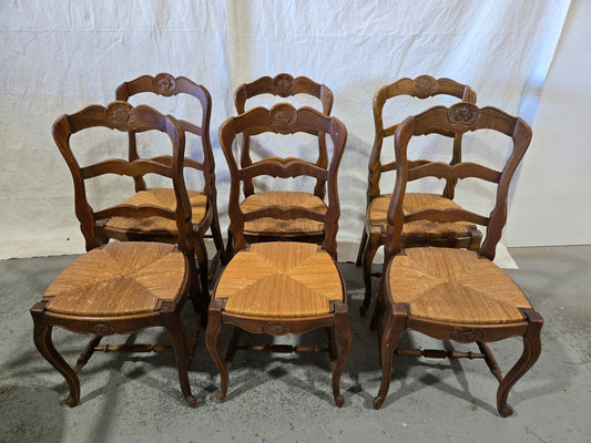 Early century oak ladderback rush chairs