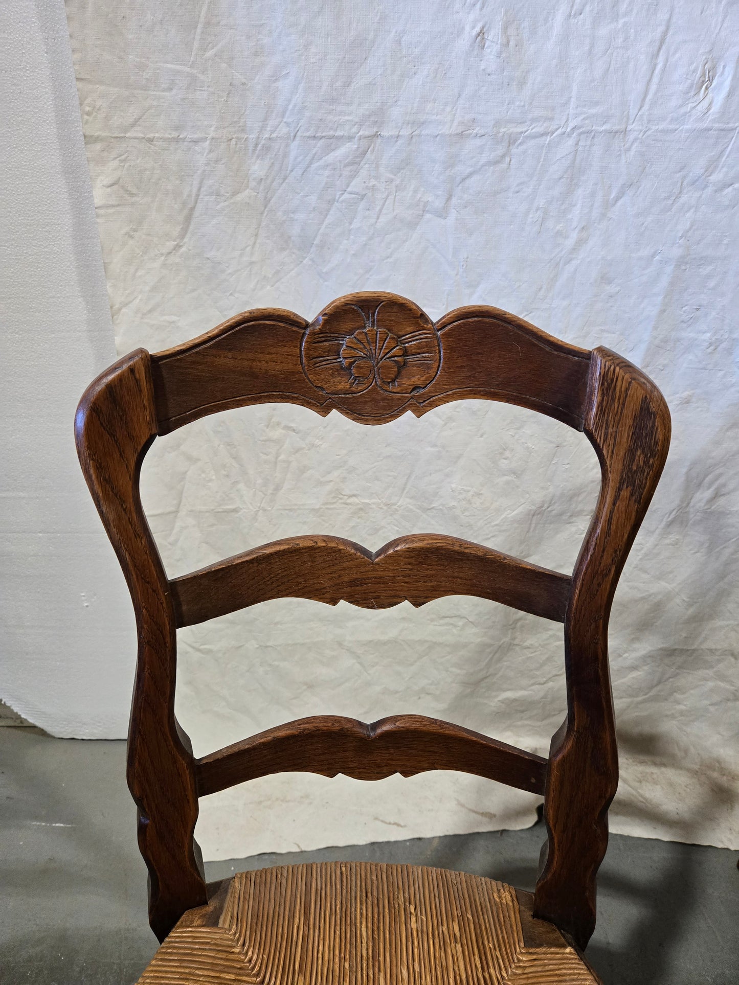 Early century oak ladderback rush chairs