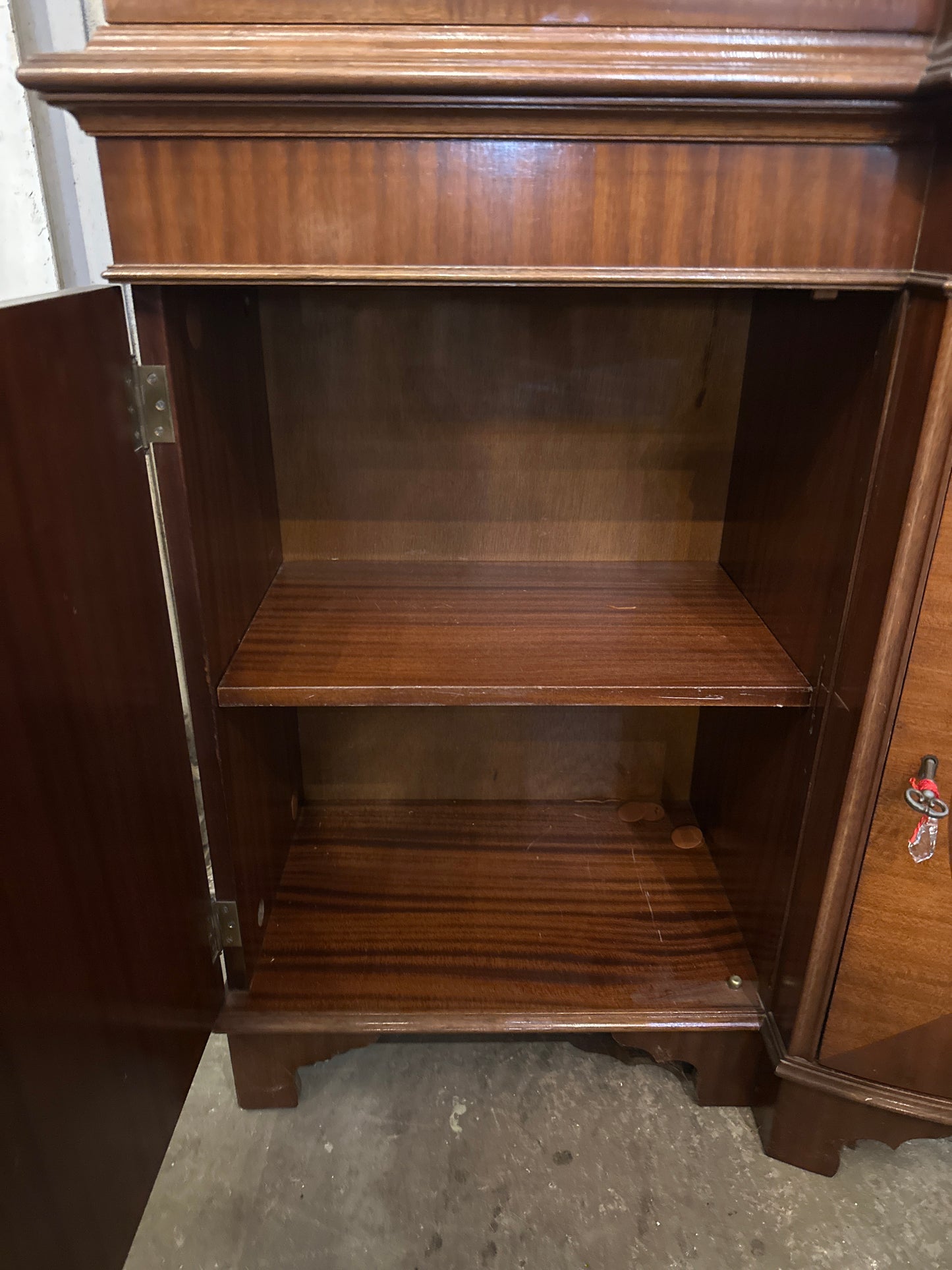 Mid 1900s Georgian mahogany breakfront China cabinet