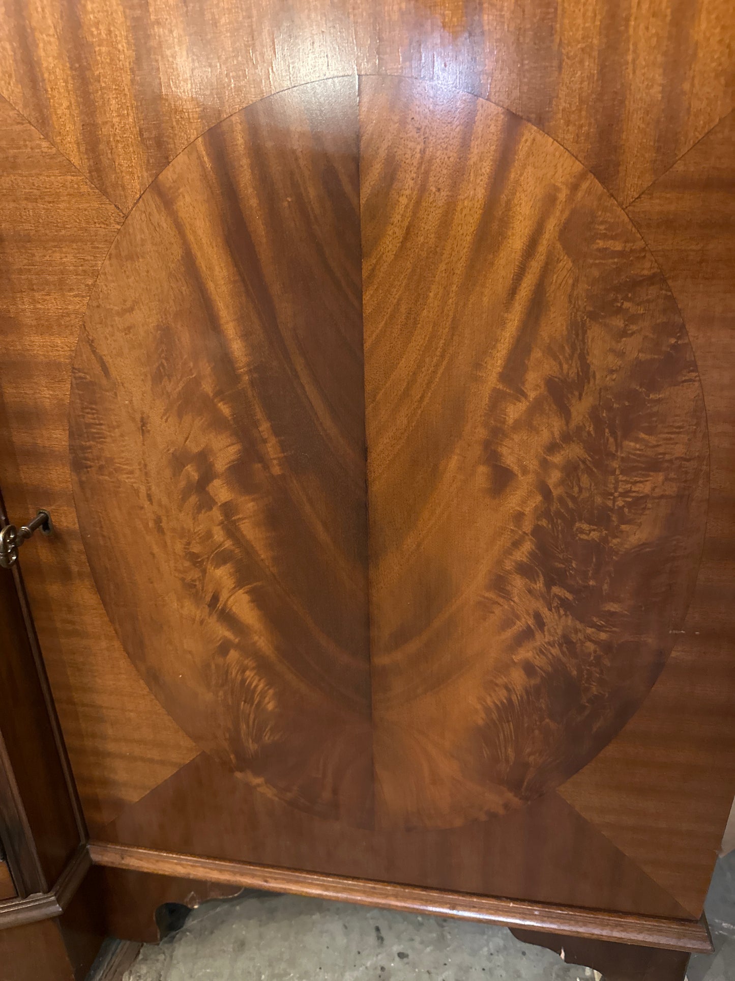 Mid 1900s Georgian mahogany breakfront China cabinet