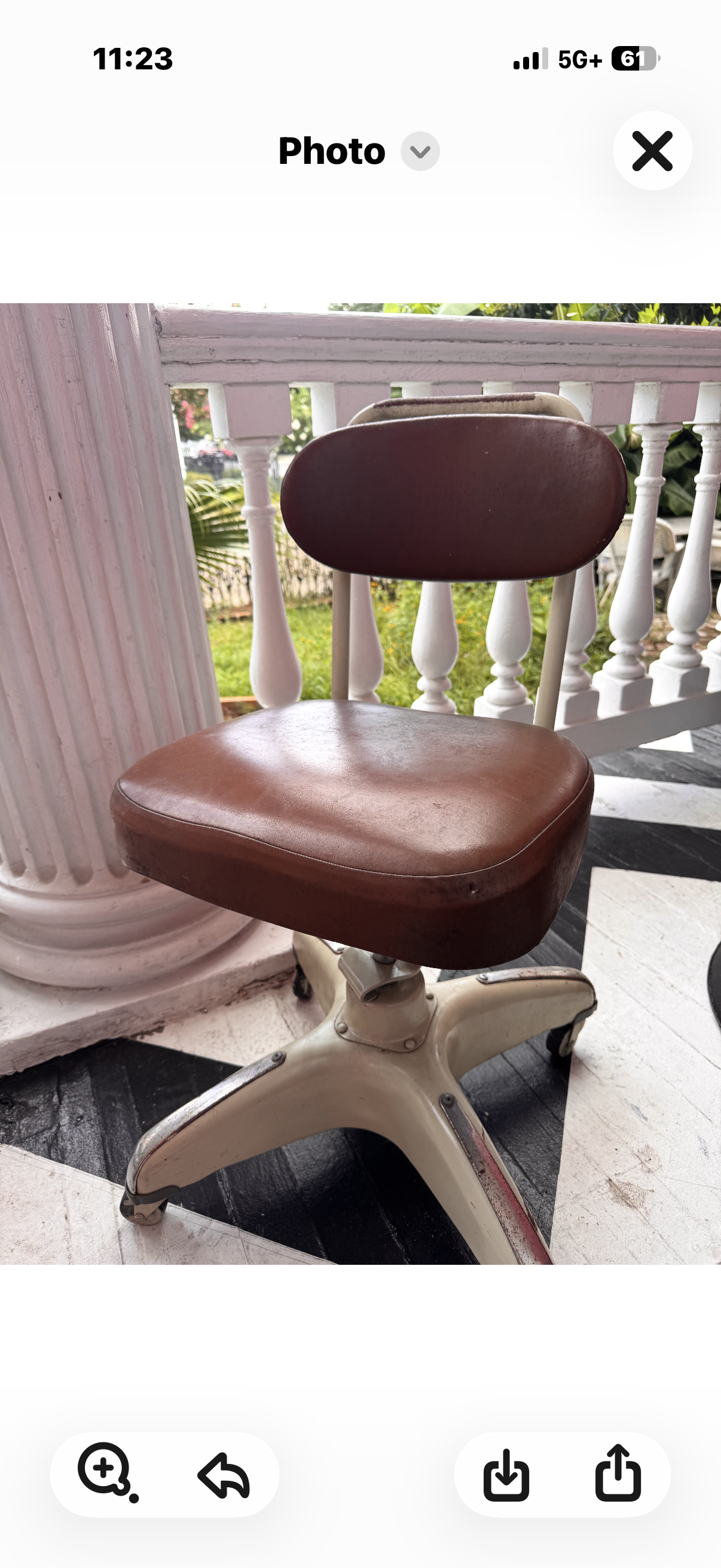 Brown leather vintage 50s chair on wheels