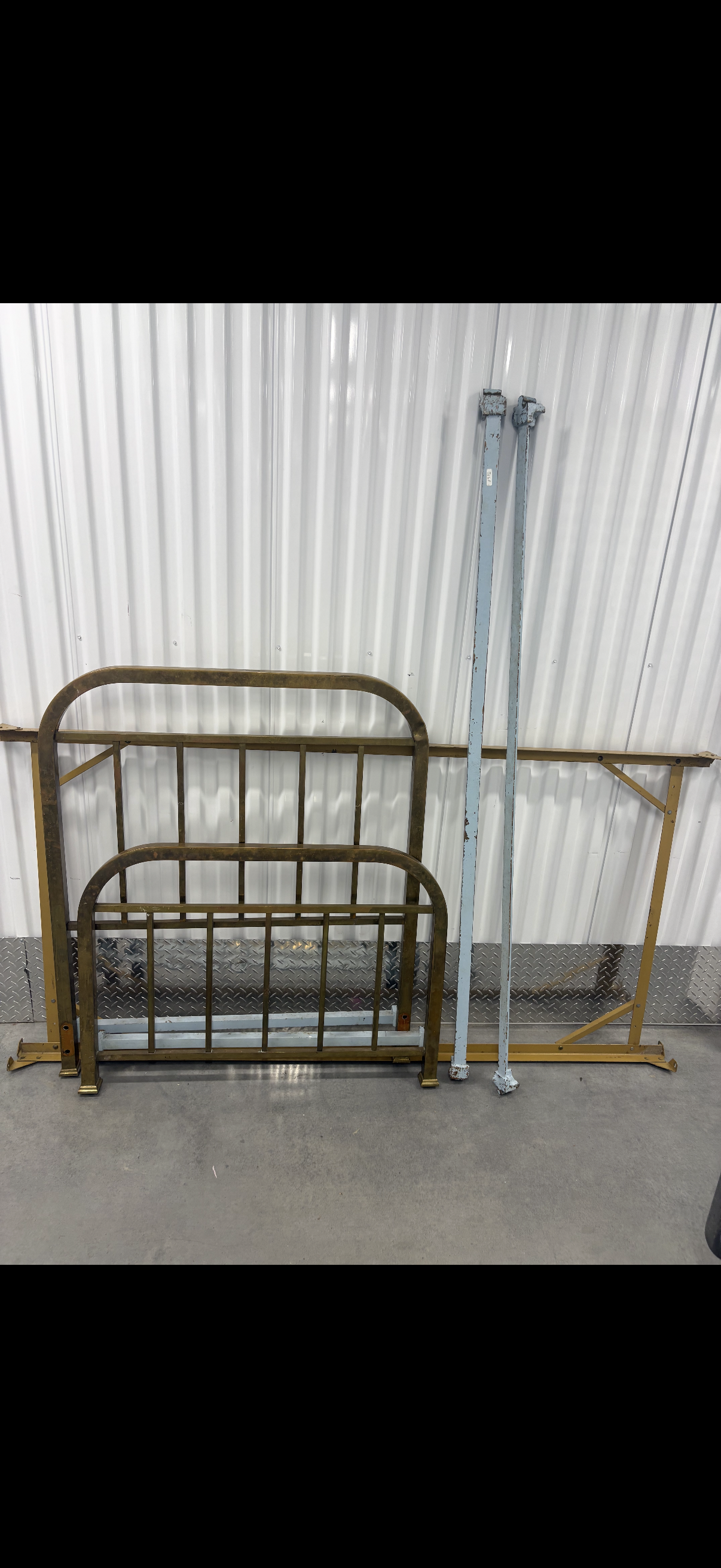 Antique twin brass bed