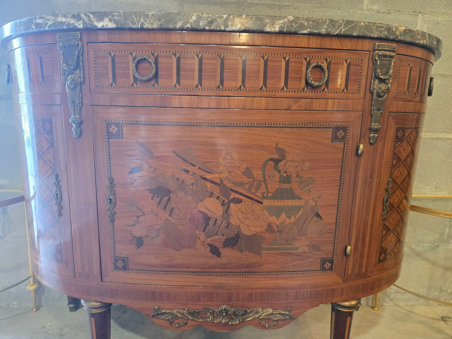 Circa 1900 French Demilune Marble Top Cabinet with Marquetry & Bronze Mounts