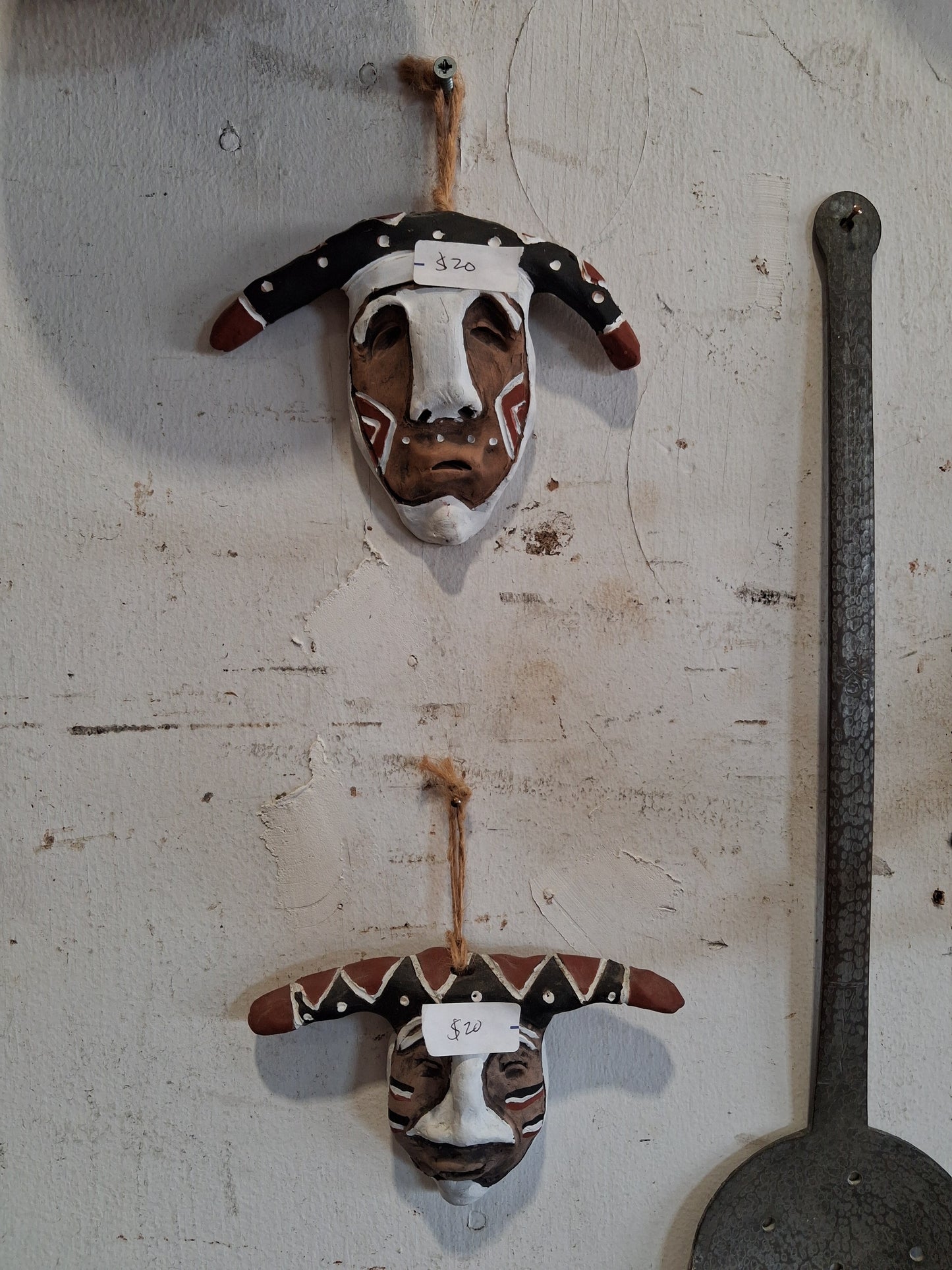 Hand-carved tribal-style wall décor