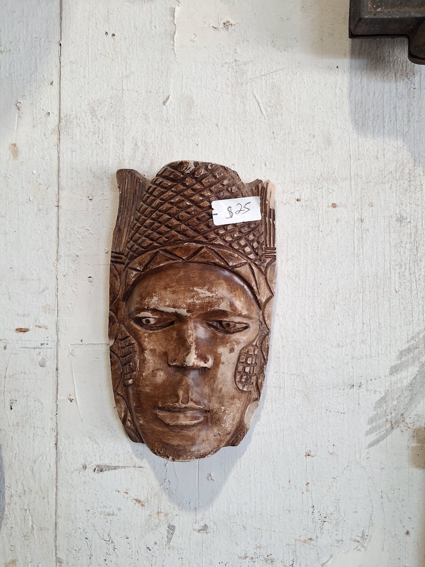 Hand-carved African-style wooden mask