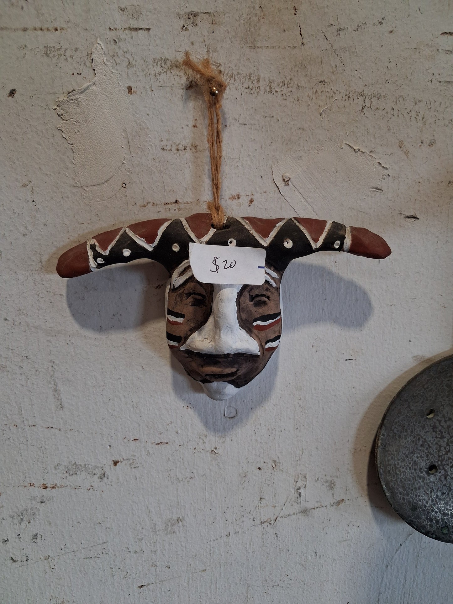 Hand-carved tribal-style wall décor