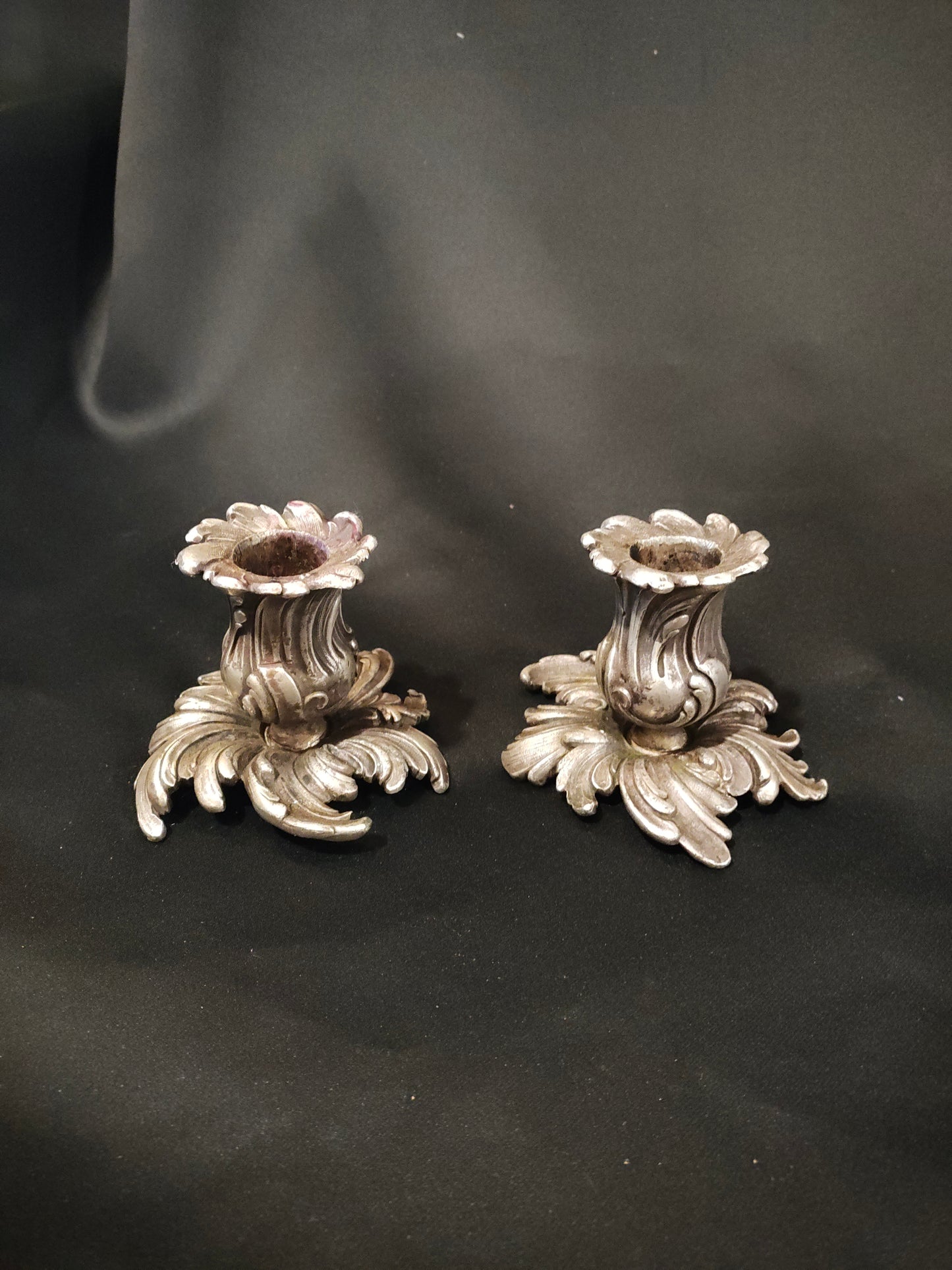 Pair of Rococo Style Silvered Leaf Candleholders