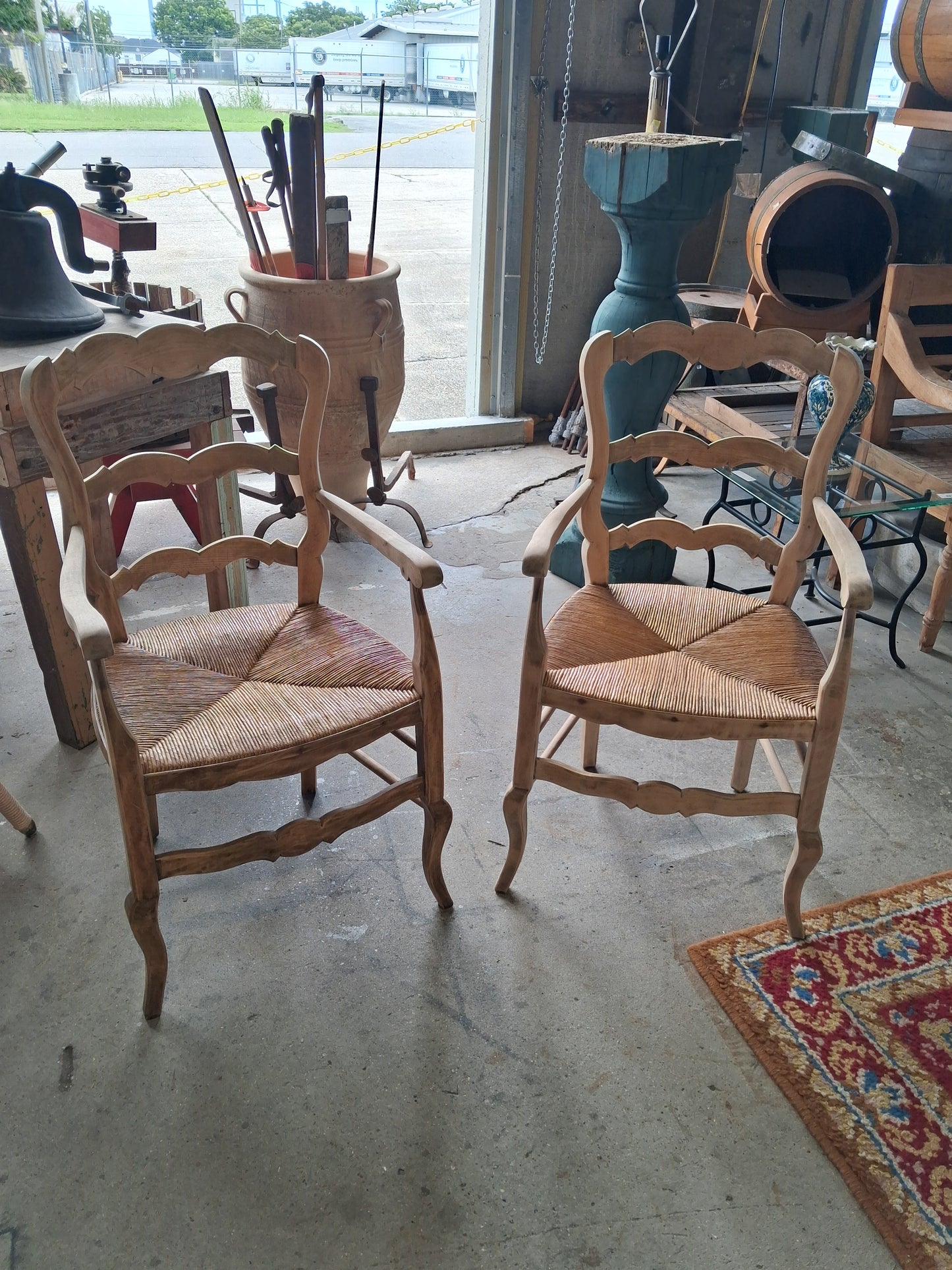 Pair of ladder back armchairs