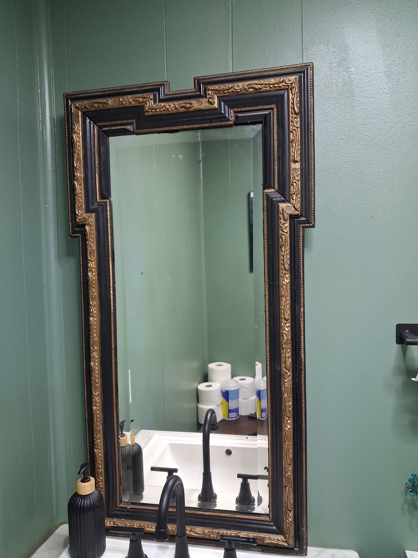 Black and gold mirror